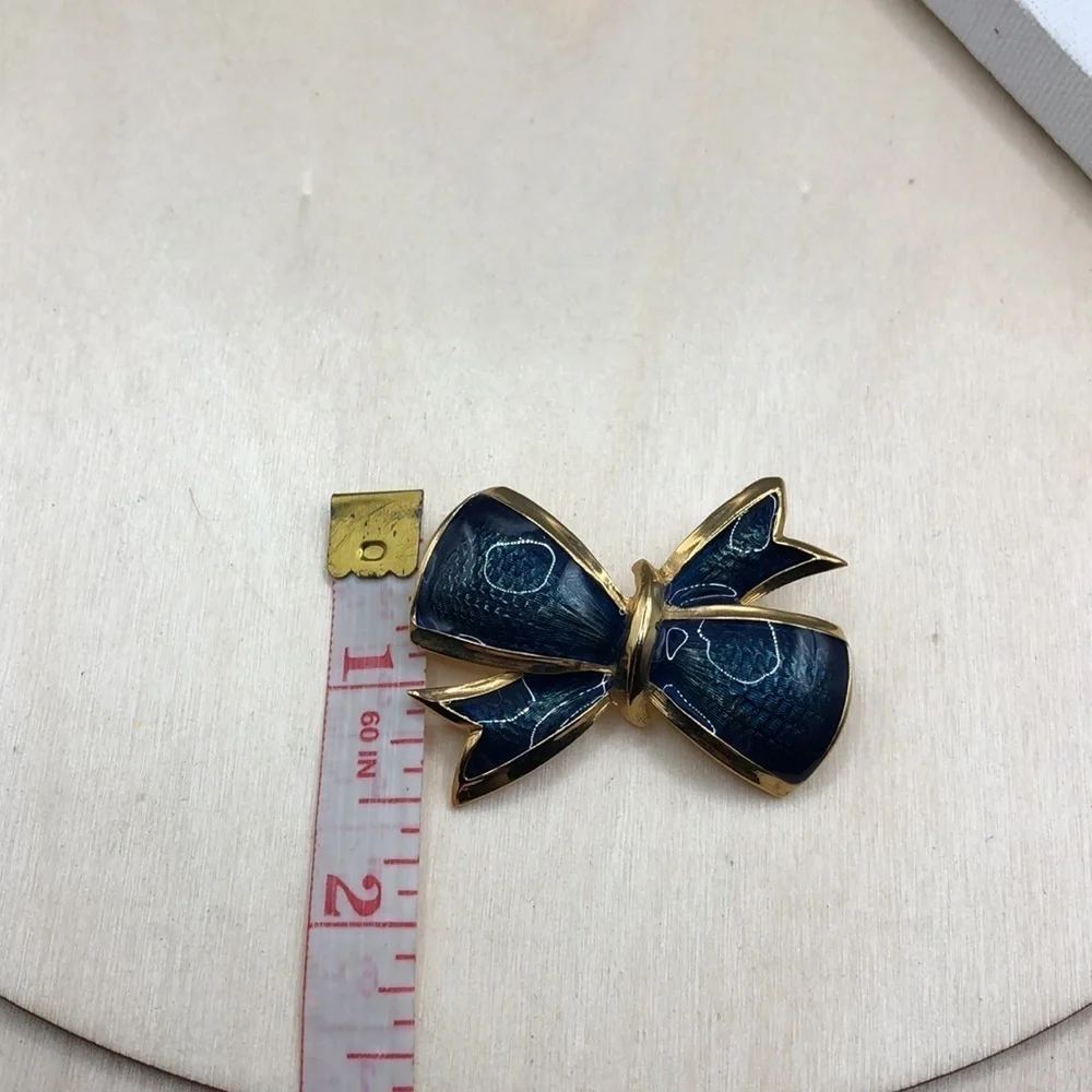 Vintage enamel fancy  bow brooch, textured look